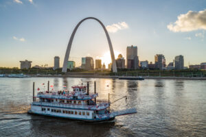 Courtesy The Gateway Arch A boat glides along the Mississippi River with the Gateway Arch in the background.
