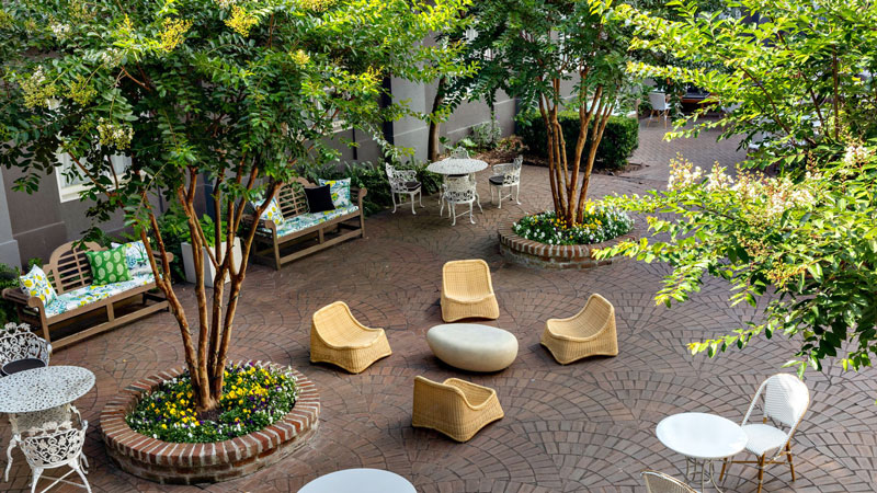 Courtesy The Kimpton Brice The outdoor seating area at the Secret Garden at The Kimpton Brice hotel in Savannah, Ga.