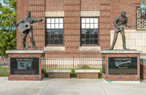 Statues of music legends Elvis Presley and James Burton near the Shreveport Municipal Auditorium. 