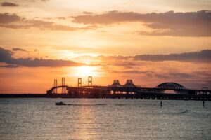 The sun sets over a bridge on Kent Island in Maryland. 