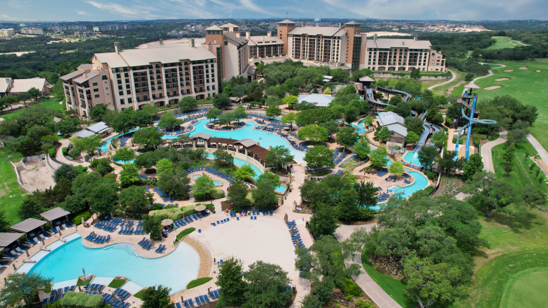 An overview shot of the JW Marriott San Antonio Hill Country Resort & Spa surrounded of outdoor pools.