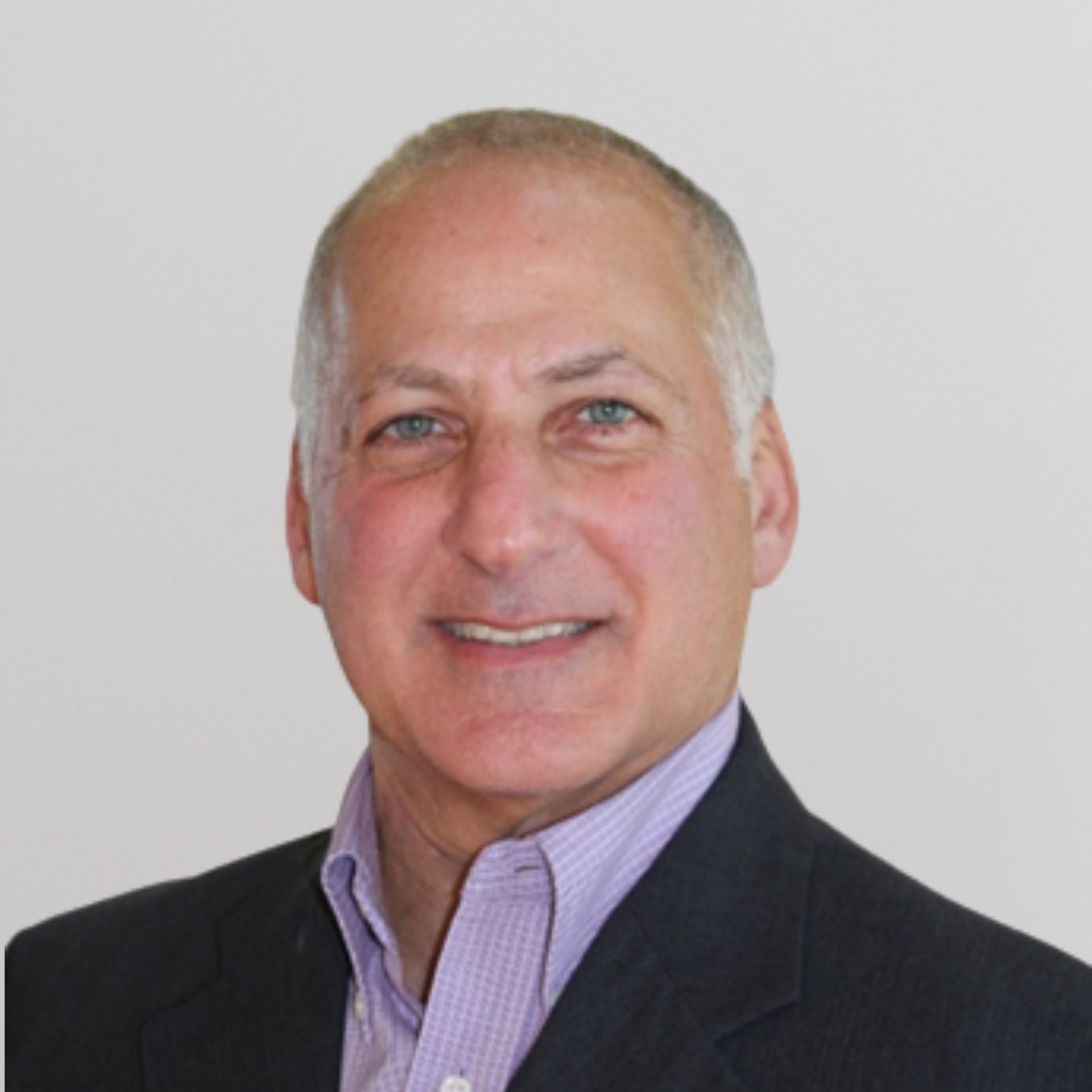 A headshot of Rich Keurajian