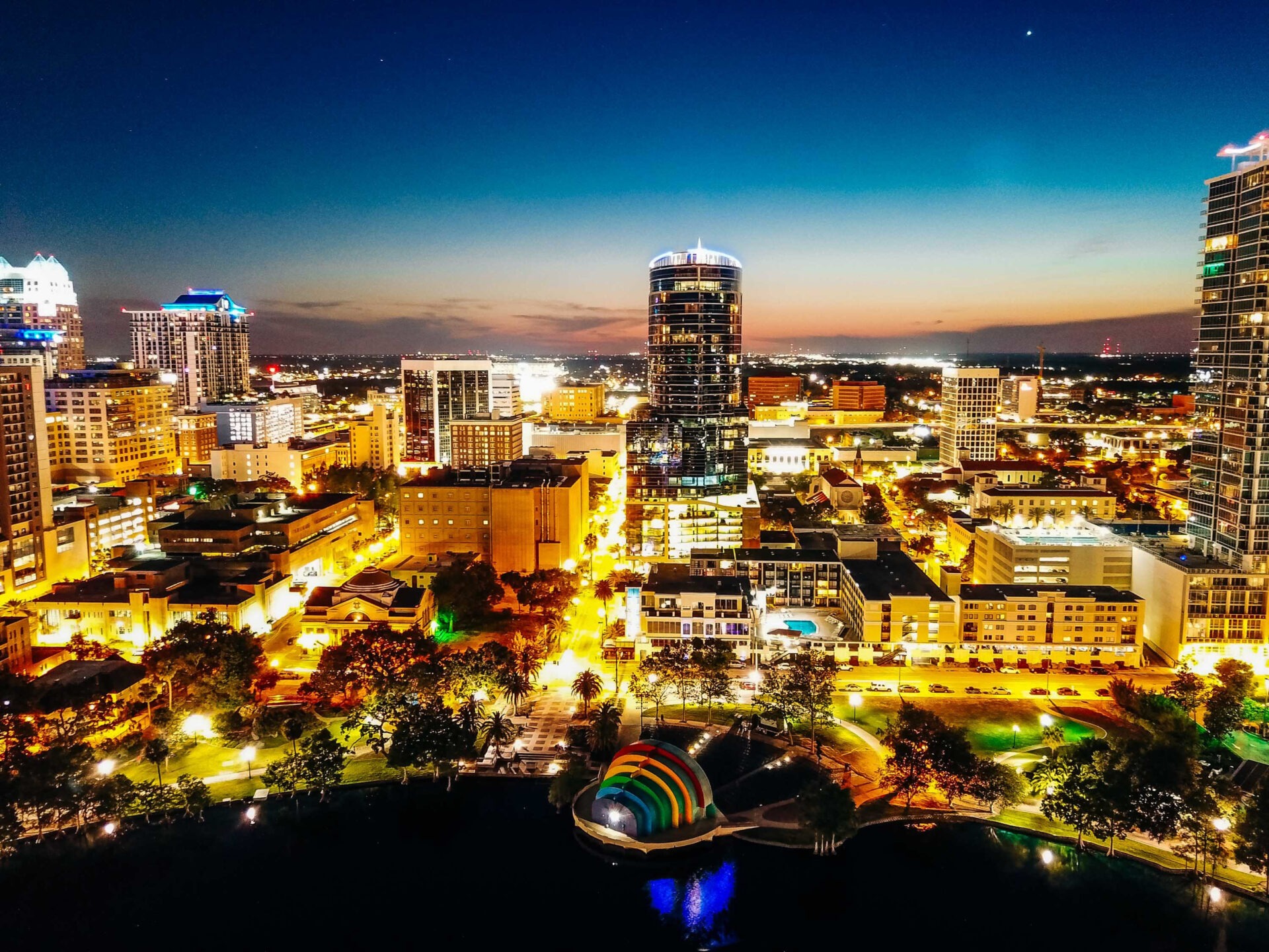 A drone shot of Orlando at night.